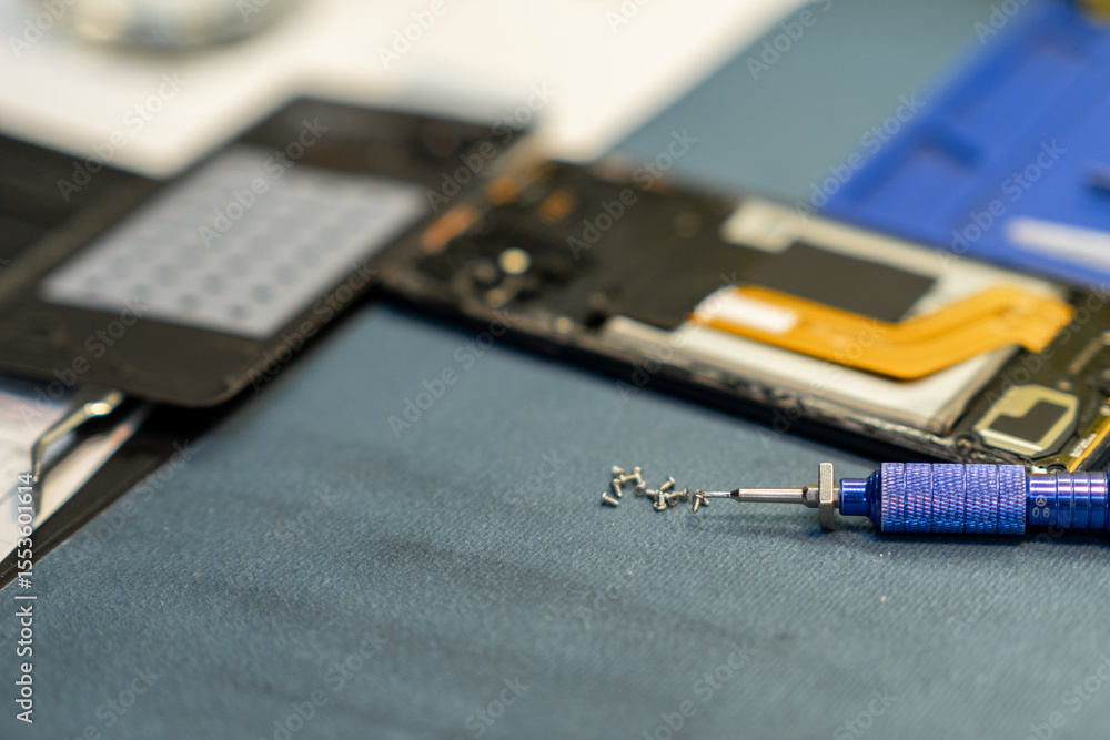 Poster Expert Phone Repair Process Showcasing Disassembled Smartphone Components and Precision Tools in a Workshop Setting