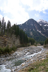 Fototapeta premium Neustift im Stubaital, Austria - April 20, 2025 - WildeWasserWeg in the Stubai Valley at Easter time