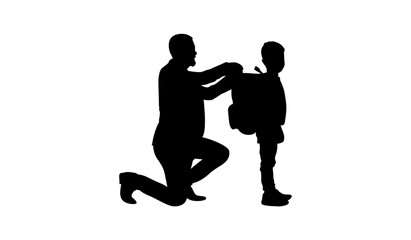 Silhouette of a father kneeling and helping his son put on his backpack.