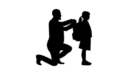 Silhouette image of a father kneeling, helping his young daughter put on her school backpack.
