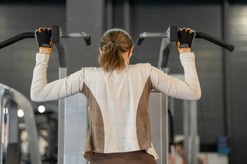 Strength Training Routine at the Gym With Focus on Upper Body Workout for Women