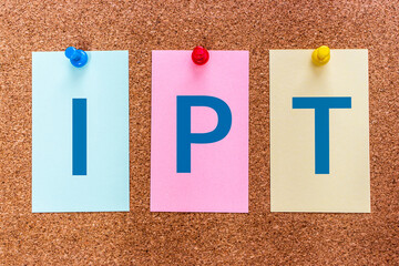 Conceptual 3 letters keyword IPT (Interpersonal Therapy), on multicolored stickers attached to a cork board.