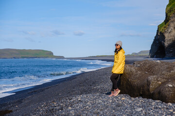 Exploring the unique beauty of Reynisfjara Beach in Iceland on a sunny day