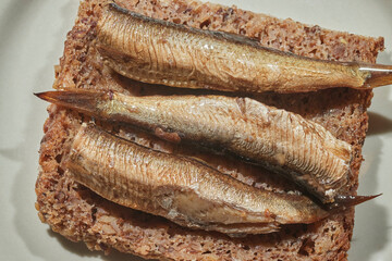 Smoked Sprats on pumpernickel bread