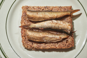 Smoked Sprats on pumpernickel bread