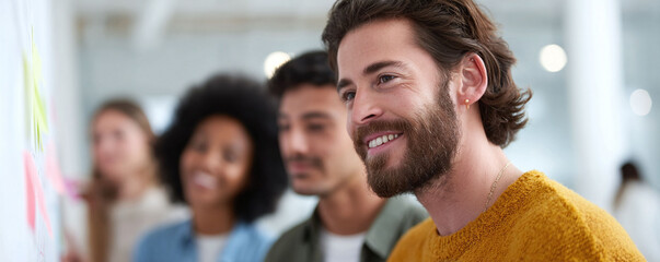 Obraz premium Diverse team collaborating on a project, brainstorming ideas. Focused, smiling faces convey innovation, teamwork, and positive energy. Ideal for business, education, or success.