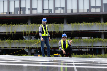 Professional engineer team check new solar roof project , green and renewable energy supply for...