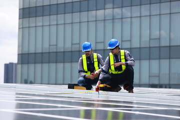 Professional engineer team check new solar roof project , green and renewable energy supply for...