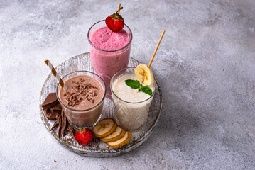 Milkshake from strawberry, banana and chocolate