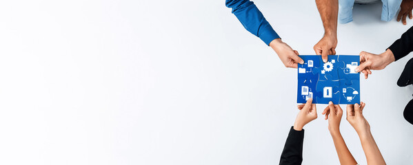 A dynamic scene showing diverse hands holding a digital strategy plan, symbolizing collaboration...