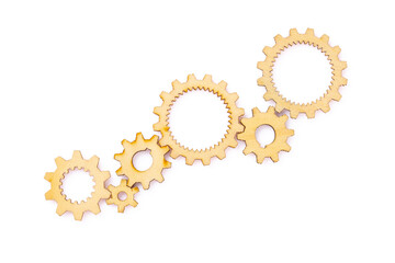 Wooden cogwheels on white background	
