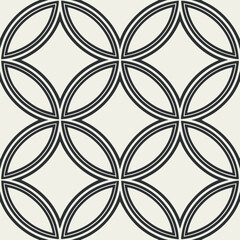 Seamless pattern of overlapping circles with a double outline, creating a geometric design on a light background