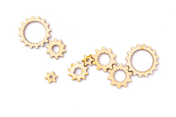 Wooden cogwheels on white background	

