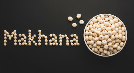 Text Makhana made up of foxnut seeds/makhana