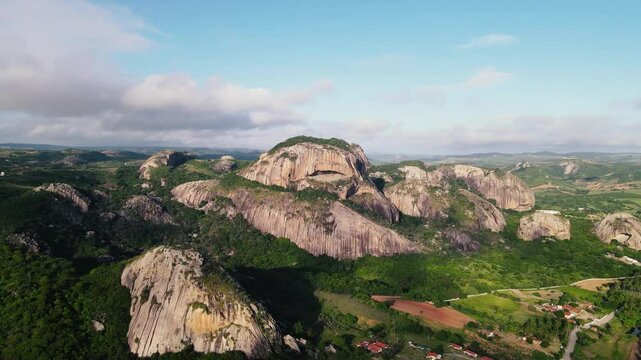 Stunning aerial footage of Pedra da Boca, a unique rock formation located in Para&iacute;ba, Brazil. Captured by drone, the video showcases the natural beauty, dramatic cliffs, and lush landscape of this ico