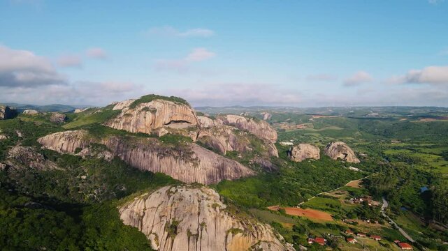 Stunning aerial footage of Pedra da Boca, a unique rock formation located in Para&iacute;ba, Brazil. Captured by drone, the video showcases the natural beauty, dramatic cliffs, and lush landscape of this ico