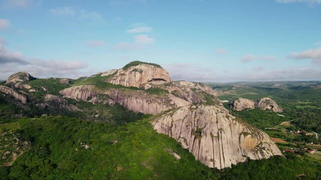 Stunning aerial footage of Pedra da Boca, a unique rock formation located in Para&iacute;ba, Brazil. Captured by drone, the video showcases the natural beauty, dramatic cliffs, and lush landscape of this ico