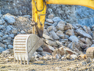 Work machines working in a quarry