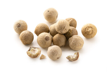 White peppercorns isolated on white background. Pile of white peppers macro.