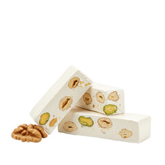 Nougat with nuts on white background in minimal style  