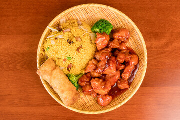 General Tso's chicken with egg roll and fried rice