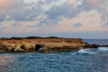 Eroded Coastal Cliffs by the Mediterranean Sea, Golden coastal rock formations shaped by erosion,...