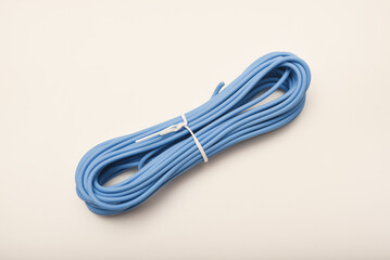 A coil of copper wire. Bundles of connecting wires.