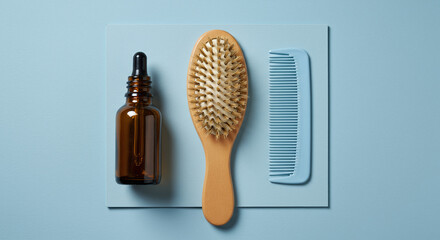 Haircare products on light blue background. Flat lay.