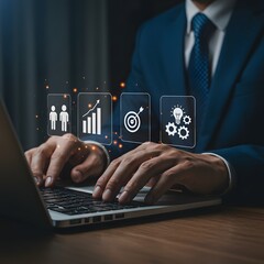 Businessman using laptop with digital icons representing business growth and strategy