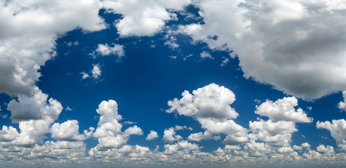 Florida weather. Blue sky with white summer rain clouds. Colorful summer landscape