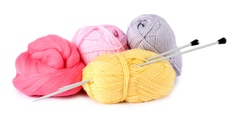 Felting wool and knitting yarn with needles isolated on white