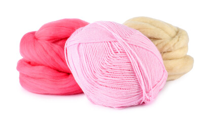 Felting wool and knitting yarn isolated on white