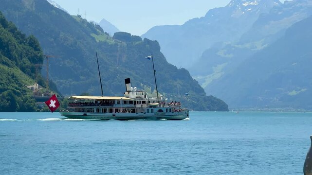 Brunnen, Switzerland - June 22, 2025: Nostalgic steamboat on Lake Lucerne on a sunny summer's day.