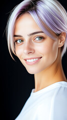 Purple hair young woman in her 20s wearing white shirt, smiling, looking over her shoulder, isolated on black background