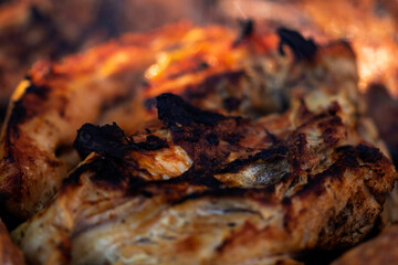 Pork chops, steak, sausages on barbecue grill