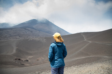 hiker trekking on mount Etna