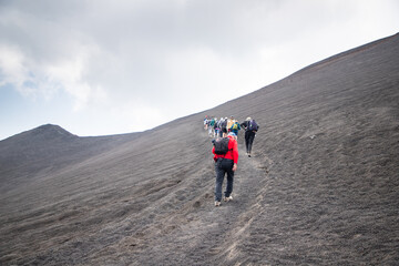 hiker trekking on mount Etna