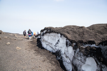 hiker trekking on mount Etna