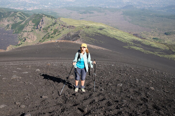 hiker trekking on mount Etna