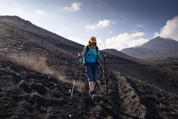 hiker trekking on mount Etna