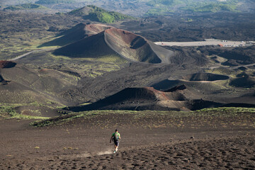 hiker trekking on mount Etna