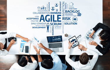 A diverse team reviews agile methodologies, emphasizing scrum and kanban practices to enhance...