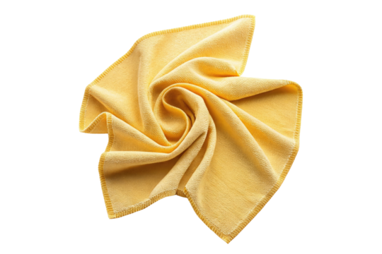 Yellow microfiber cleaning cloth folded in a swirl isolated on transparent background
