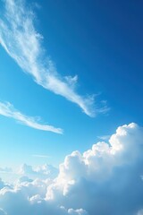 High-altitude wispy cirrus clouds contrasting with deep blue sky canvas, heavenly, high altitude