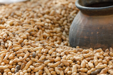 Organic Raw Peanuts Harvested on Farm in Rustic Pottery Traditional Agricultural Crop and Food...