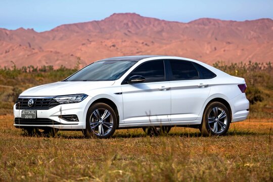 Brazil, June 26, 2025. White Volkswagen Jetta RL 2019 sedan parked in a scenic landscape