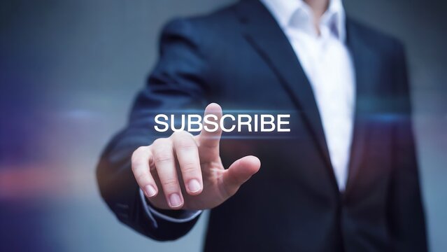 Businessman s finger presses the subscribe button on a digital interface