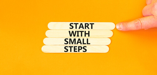Start with small steps symbol. Concept words phrase Start with small steps on beautiful stick....