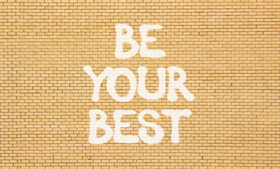Motivational be your best symbol. Concept words Be your best on beautiful brown brick wall....