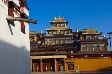 Golden-roofed Kirti Monastery stands as a prominent Tibetan Buddhist landmark in Ngawa, Amdo region, showcasing traditional architecture and vibrant cultural heritage.